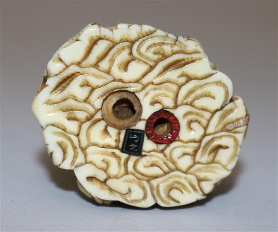 A Japanese ivory netsuke of multiple rakan, Meiji period, height 5.6cm